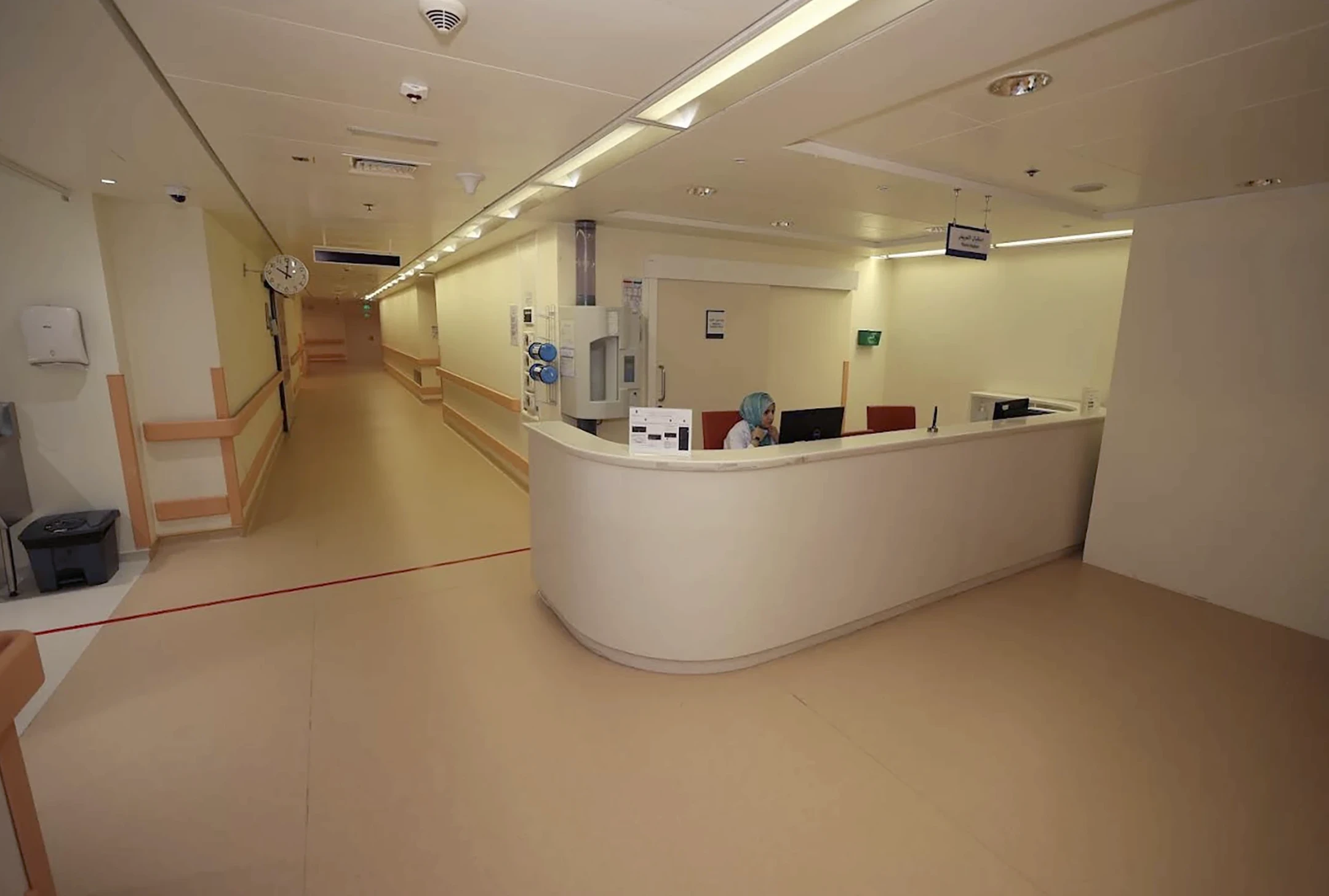 Al Qassimi Hospital VIP section, reception desk and corridor, fit-out by HQI Contracting